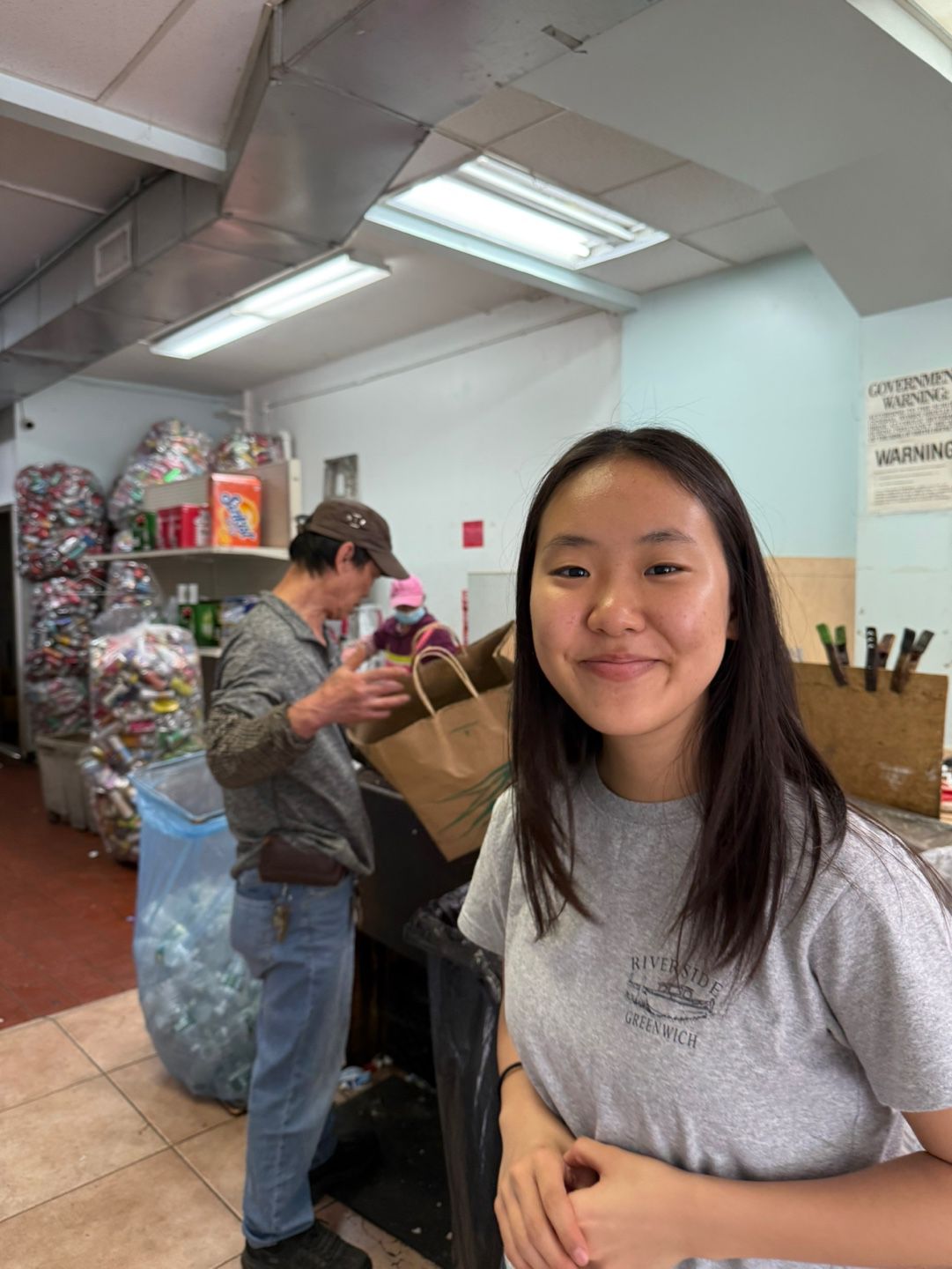 Katie at Chinatown Recycling Center