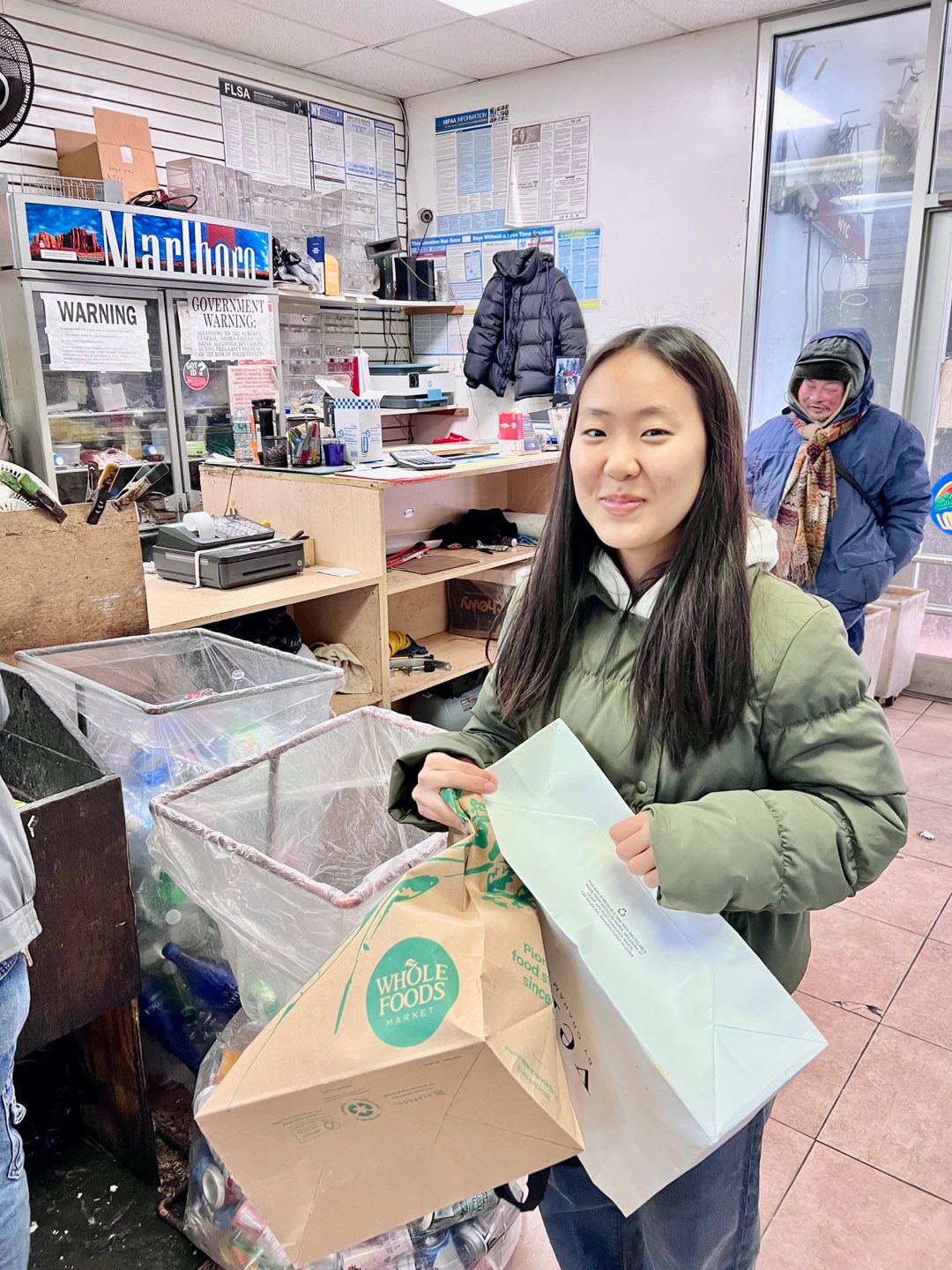 Katie collecting recyclables